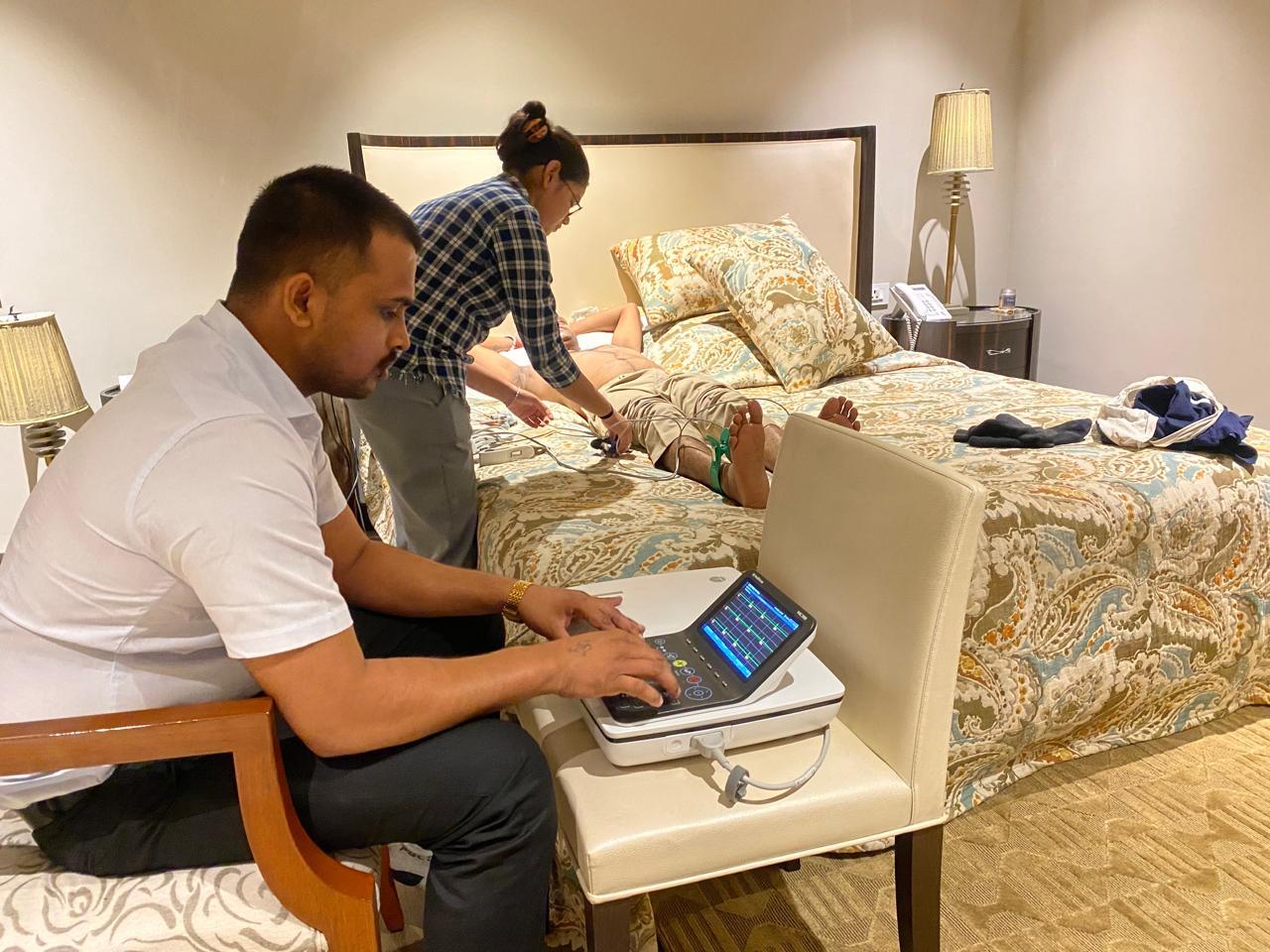 Twelve-lead ECG being recorded at a residence